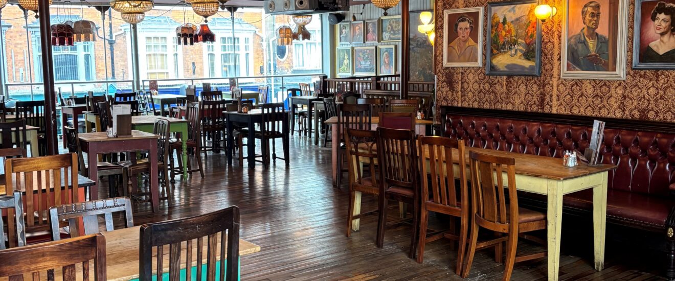 the interior of a cozy restaurant and bar, Bacco Lounge