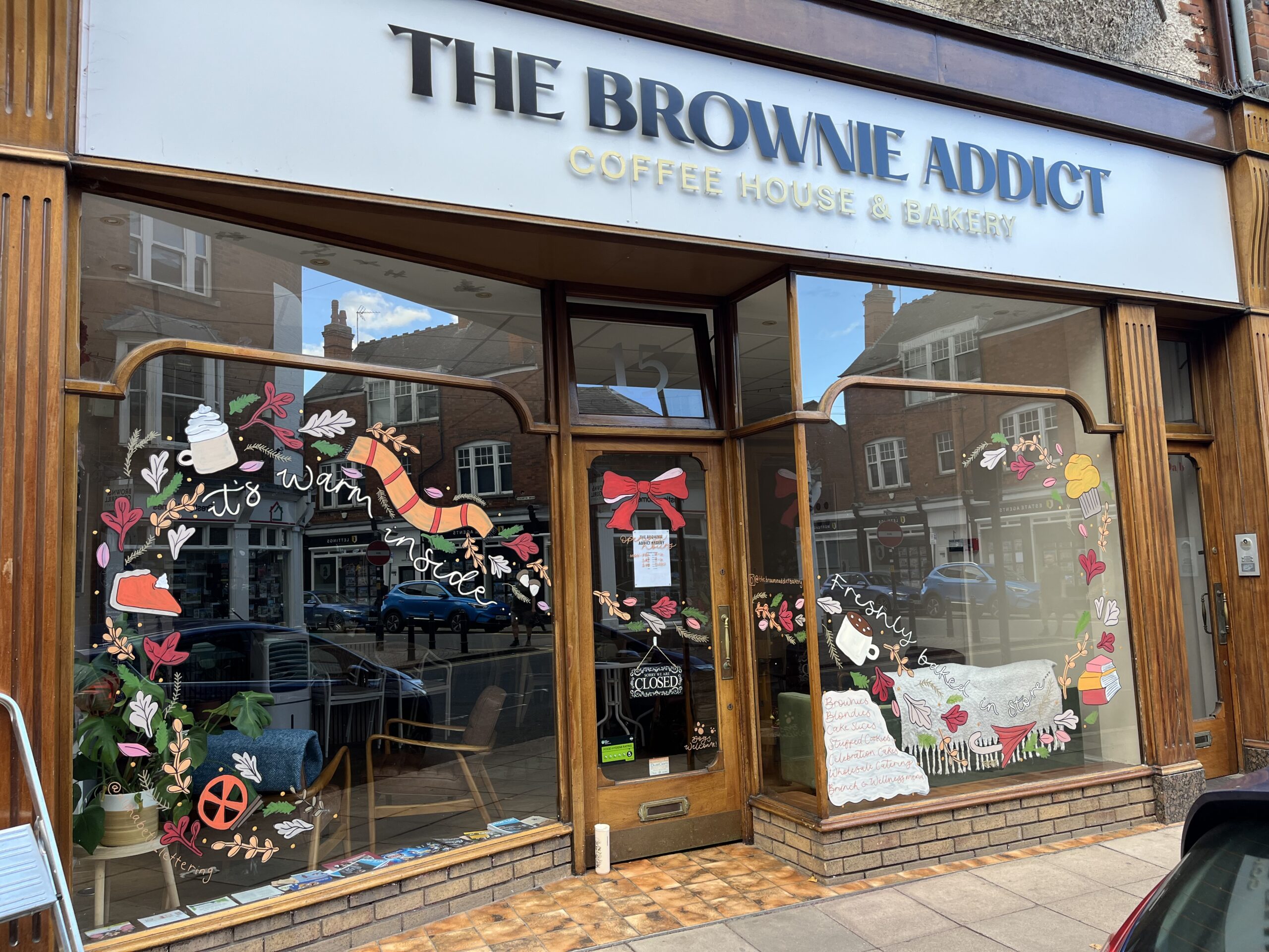 Hand painted shop front window at The Brownie Addict bakery