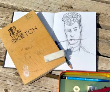 Sketchbook on a table.
